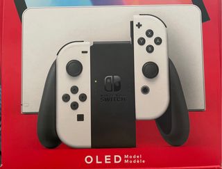 Nintendo Switch OLED, custodia regalo + 2 giochi