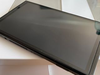 Nintendo Switch OLED, custodia regalo + 2 giochi
