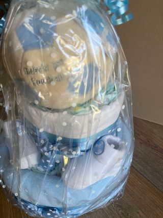 Tarta de pañales azul bebé nueva con etiquetas