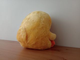 Pato de peluche amarillo suave