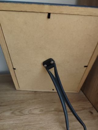 Marco de fotos con cristal azul y dorado