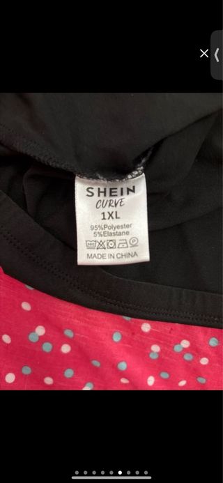 Top negro con calaveras de pedrería