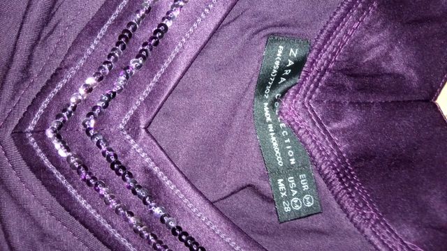 Camiseta morada con lentejuelas