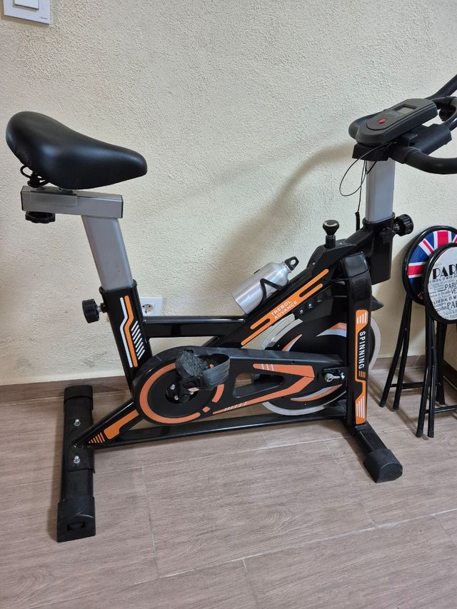 Bicicleta Estática Spinning Negra y Naranja