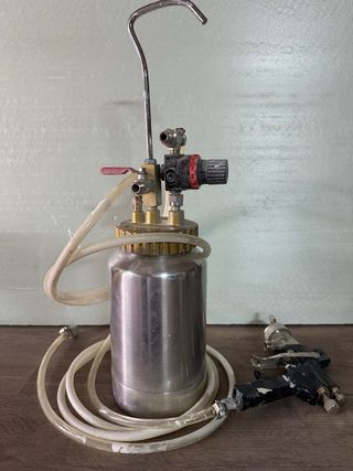 Pistola de imprimación con depósito