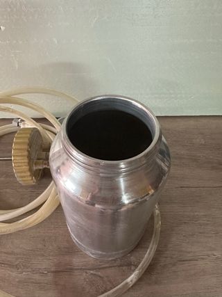 Pistola de imprimación con depósito