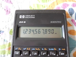 CALCULADORA HEWLETT PACKARD HP 20S,CON FUNDA.