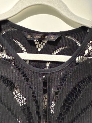 Camiseta calada con flecos