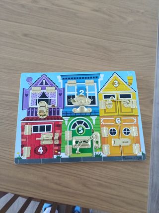 Tablero de Pestillos Melissa & Doug