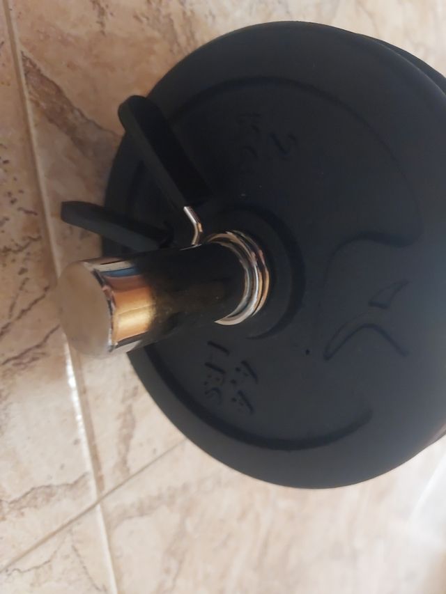 Pesi da palestra con dischi neri