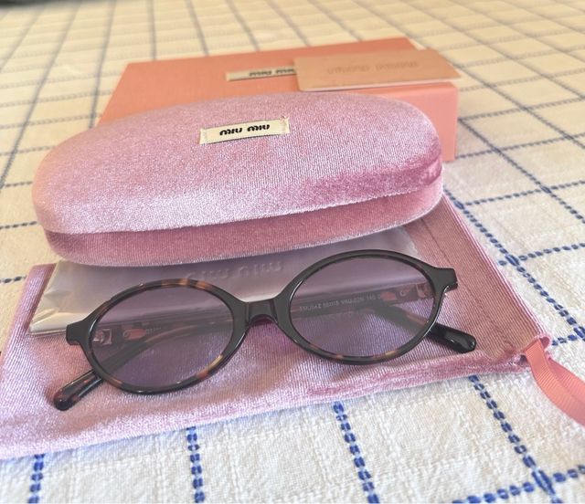 Occhiali da sole Miu Miu SMU04Z marroni