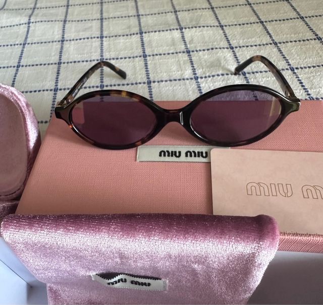 Occhiali da sole Miu Miu SMU04Z marroni