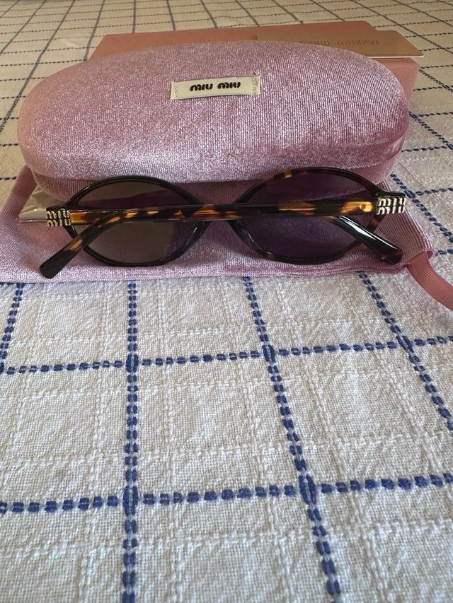 Occhiali da sole Miu Miu SMU04Z marroni