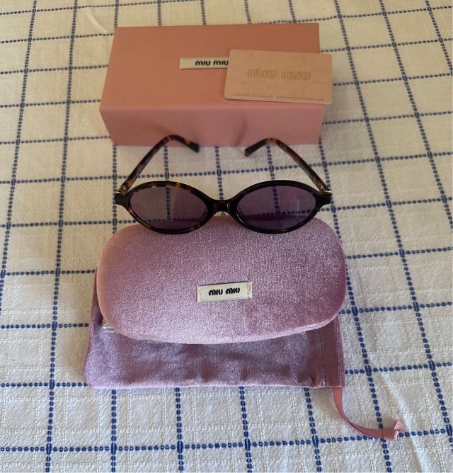 Occhiali da sole Miu Miu SMU04Z marroni