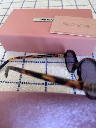 Occhiali da sole Miu Miu SMU04Z marroni
