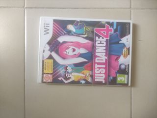 Nintendo Wii con un mando, un Nunchuk y 5 juegos