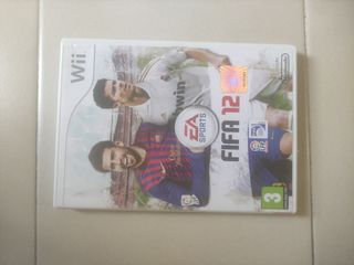 Nintendo Wii con un mando, un Nunchuk y 5 juegos