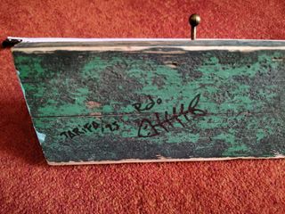 Perchero artesanal de madera y metal