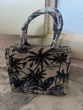 Bolso de mano con palmeras