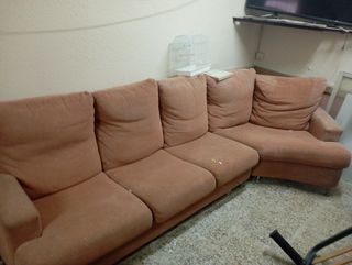 Sofá rinconero rosa de tela