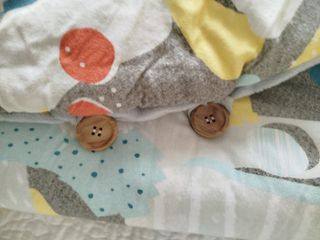 Saco arrullo bebé Tuctuc