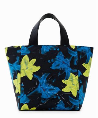 Bolso Desigual azul con flores.