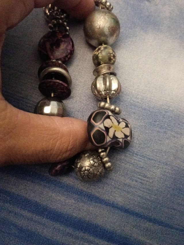 Bracciale con perle viola e argento