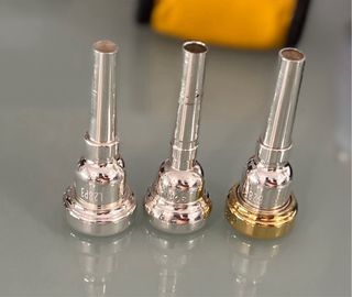 “Tú toca, yo limpio tu boquilla ”