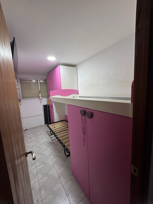 Cama juvenil con armarios y cama abatible