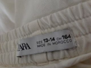 Pantaloni Zara bianchi con bottoni