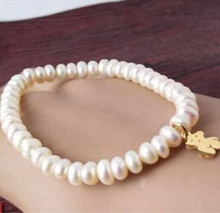 Pulsera de perlas con charm de oso