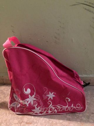 Patines de 4 ruedas rosas con la funda incluida