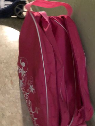 Patines de 4 ruedas rosas con la funda incluida