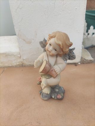 4 Angelitos musicales decorativos