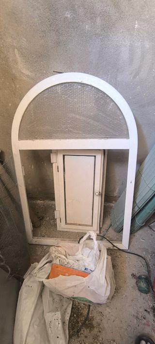Ventana doble con arco redondo