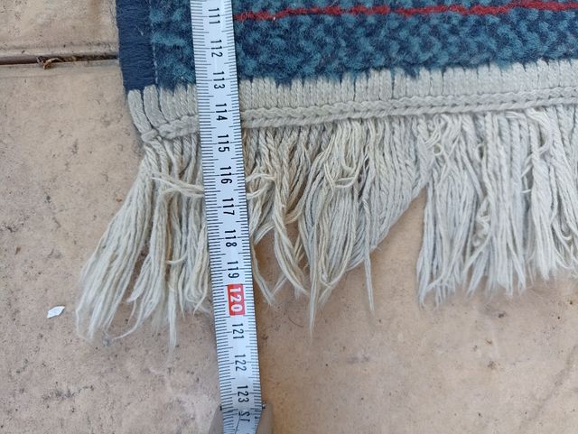 Alfombra decorativa azul y roja