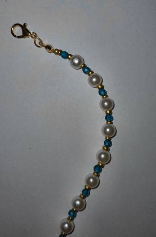 Pulsera con perlas blancas y azul turquesa – acero