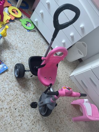 Triciclo infantil rosa y gris