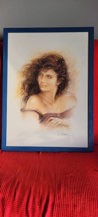 Cuadro de mujer con marco azul
54x73cm