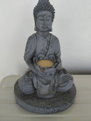 Figura Buda con vela