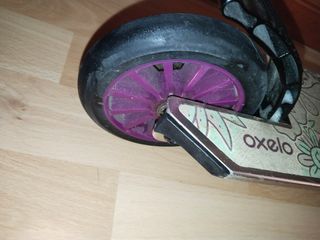 Patinete Oxelo en perfecto estado 6-10 años