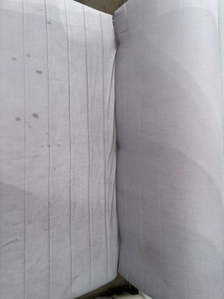 Sillón-cama gris de Ikea sin funda