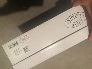 Stivali neri con frange in pelle