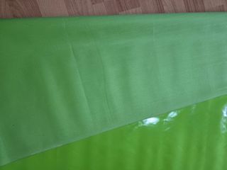 Tessuto in PVC verde per facciate continue e balconi