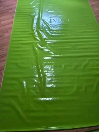 Tessuto in PVC verde per facciate continue e balconi