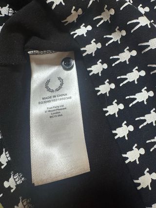 Polo Fred Perry talla XS o M. Mirar medidas :)