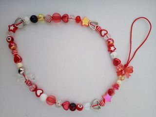 Colgante móvil abalorios naranja y plata