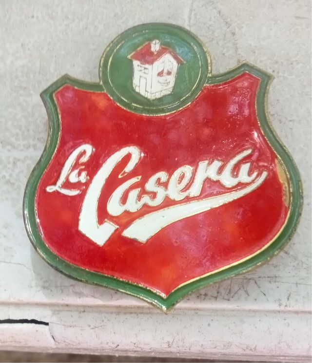 Chapa antigua La Casera