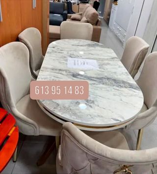 Mesa de comedor ovalada con 6 sillas