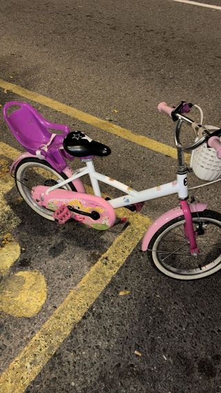 Bicicleta infantil rosa y blanca